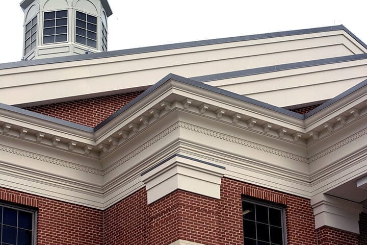 Crowning Glory: The Aesthetic and Practical Benefits of Exterior Crown Moulding - Mouldex Composites