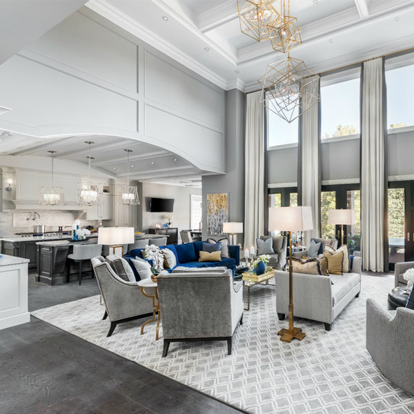 Expansive great room and kitchen from "Moving the McGillivrays" featuring custom vaulted coffered ceilings and architectural wall panels by Mouldex Composites.